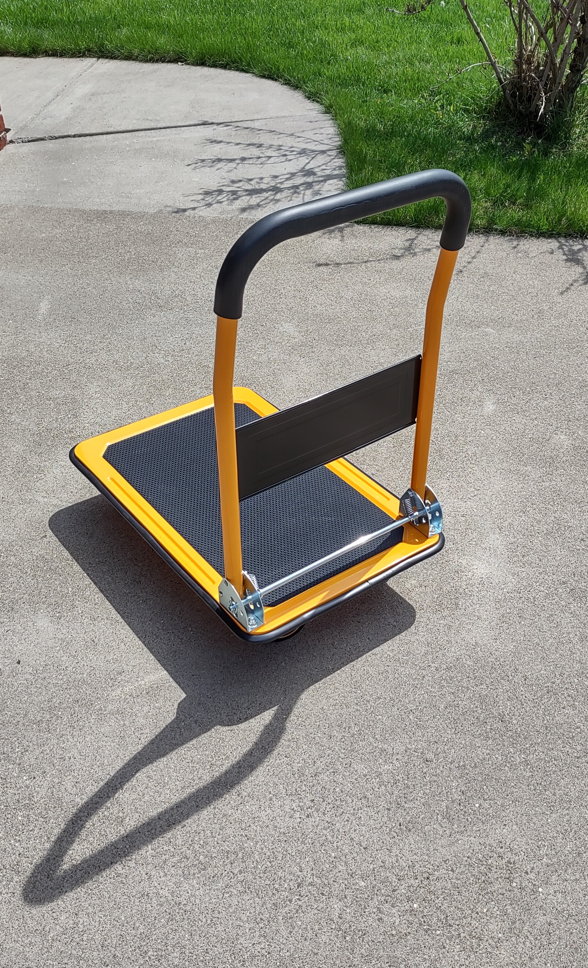 Professional yellow and black moving dolly included with every tote rental